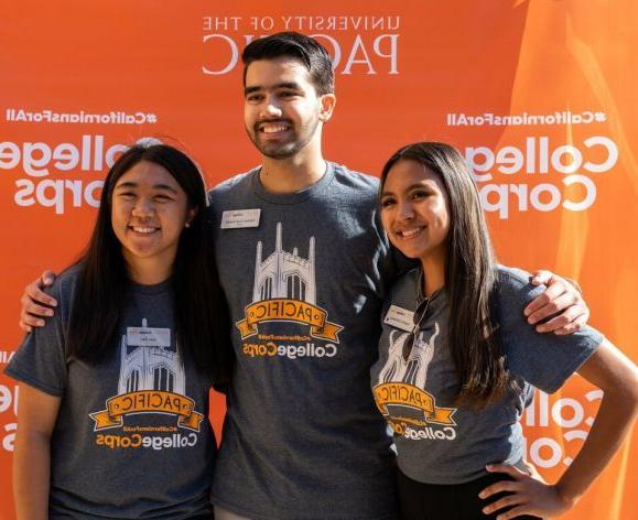 a group of Pacific students wearing College Corps shirts